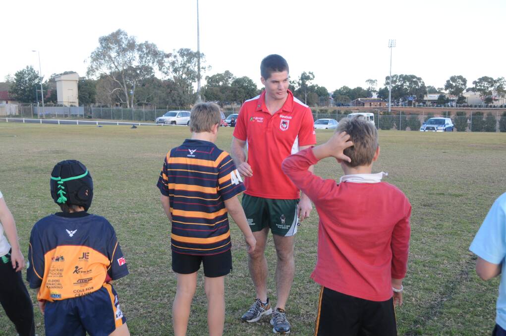 DSC 6700 
 
Charly Runciman back home in Dubbo during the season helping out with a St John's training session. Photo: AMY MCINTYRE.