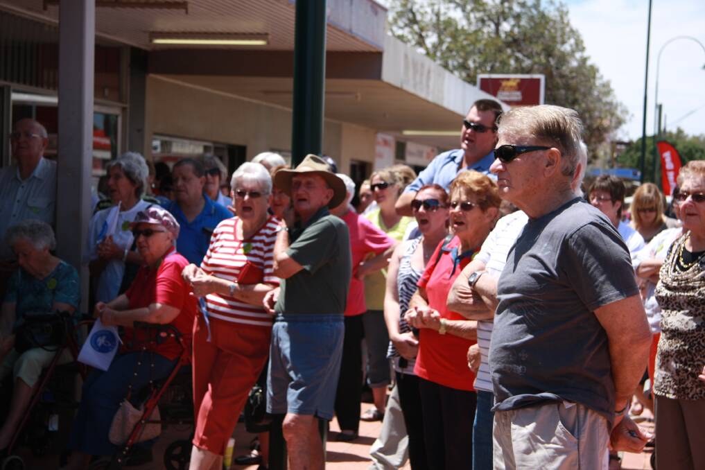 A group of about 200 locals joined with Cobar nurses in the main street on Friday to voice their concerns over the current nurse roster at the Cobar Hospital. 	Photo courtesy of The Cobar Weekly