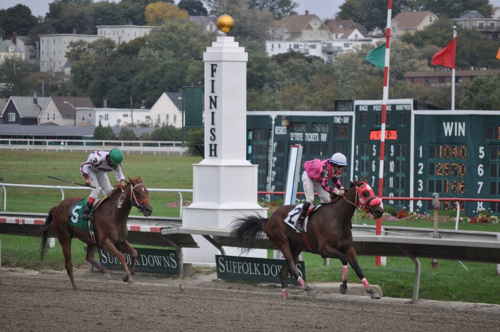 Wild Concord beats Technically Wicked in a mile race.