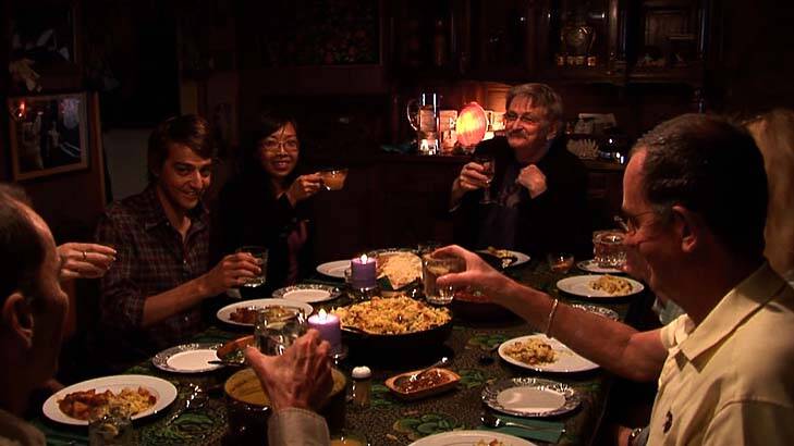 A still from the film, with some of the eight transplant recipients enjoying dinner.