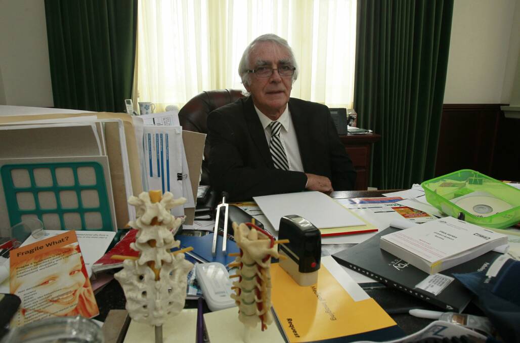 Dr David Serisier in his rooms. 	Photo: Dave Tease
