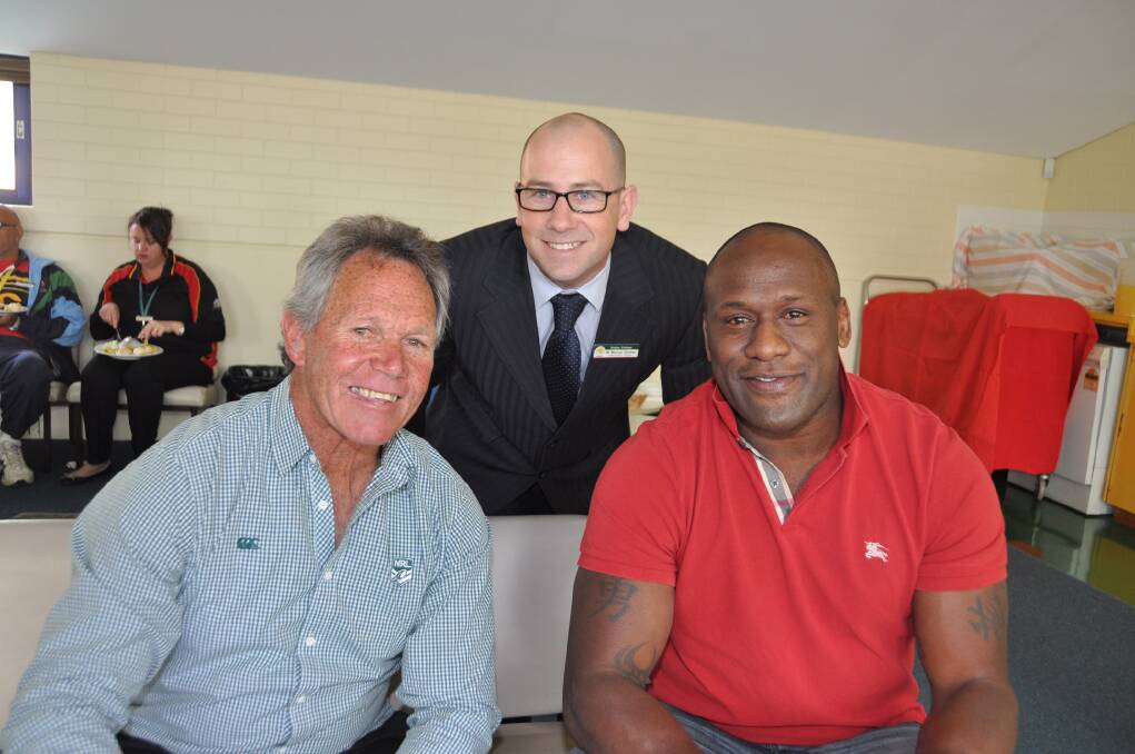 Rugby league stars Ron Gibbs and Wendell Sailor with Delroy Campus teacher Murray Graves (centre).	Photos contributed