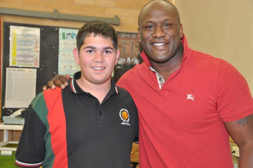 Dubbo College student Isaiah Towney with Wendell Sailor.