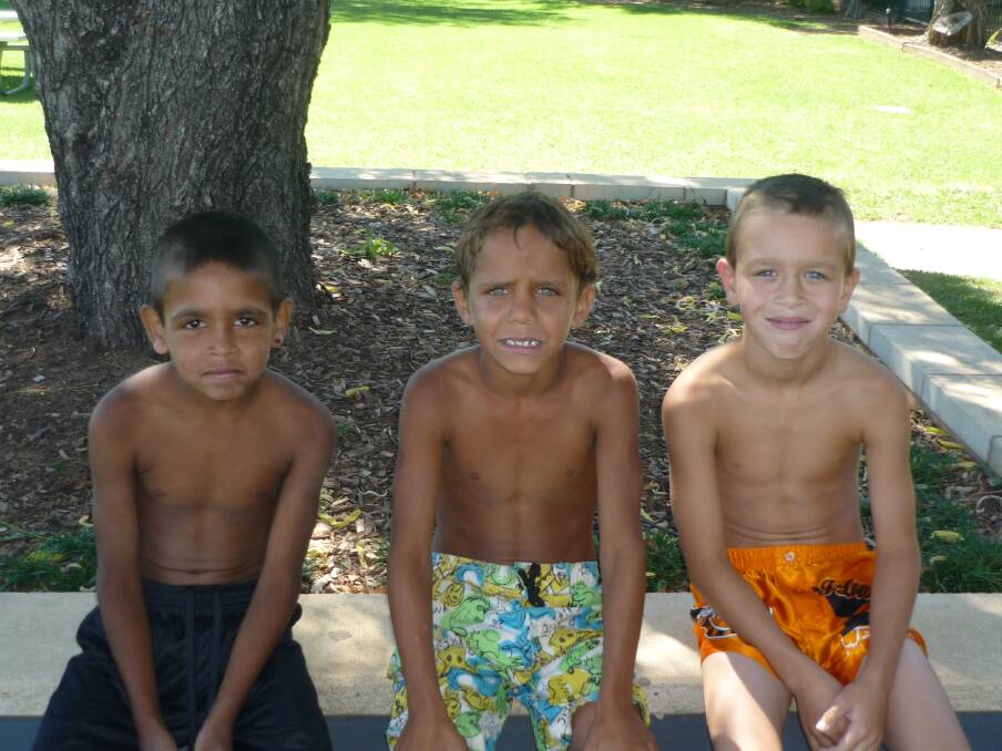 West Dubbo Public students Izziaha, Jaeydyn and Tyrell waiting for their next event. 	Photos contributed