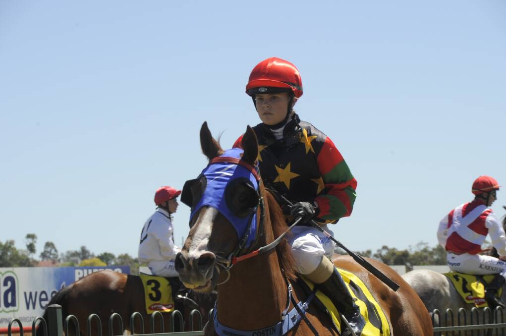Winona Costin comes back to scale after guiding Jetking to victory yesterday. 					 Photos: BELINDA SOOLE