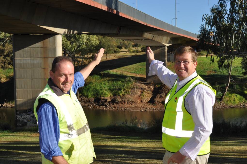 Roads and Maritime Services engineer Peter Hamilton and Dubbo MP Troy Grant inspect the LH Ford Bridge as they announce a $6 million upgrade of the east-west link. Photo contributed