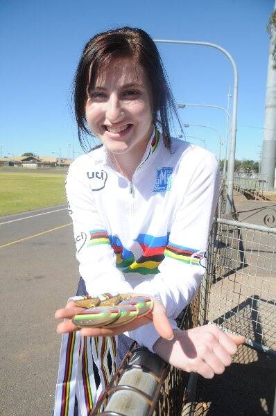 Megan Dunn with her three gold medals won at the World Junior Cycle Championships held in Moscow, Russia.