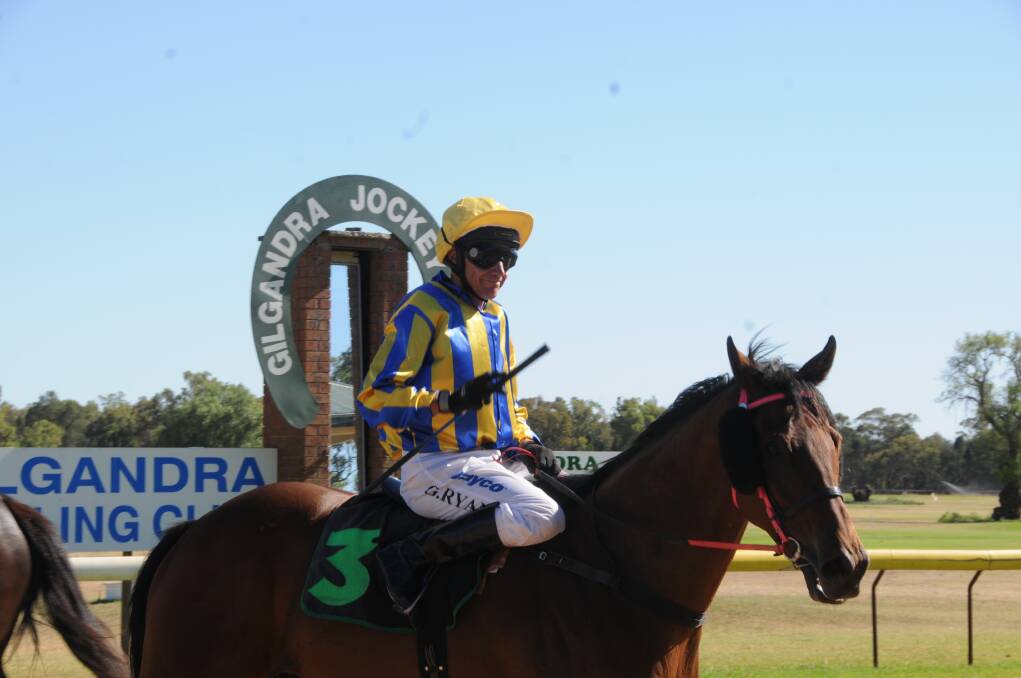 Greg Ryan and Freton return to scale after a narrow win in yesterday's $27,000 Gilgandra Bowling Club Gilgandra Cup (1600m). 			 	     Photo: BEN WALKER