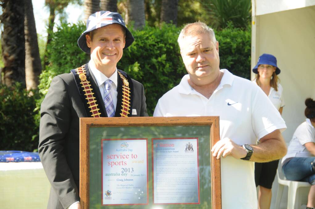 Craig Johnston stands proudly with mayor Mathew Dickerson after receiving his Australia Day award for Services to Sport. Photo: KATHRYN O'SULLIVAN