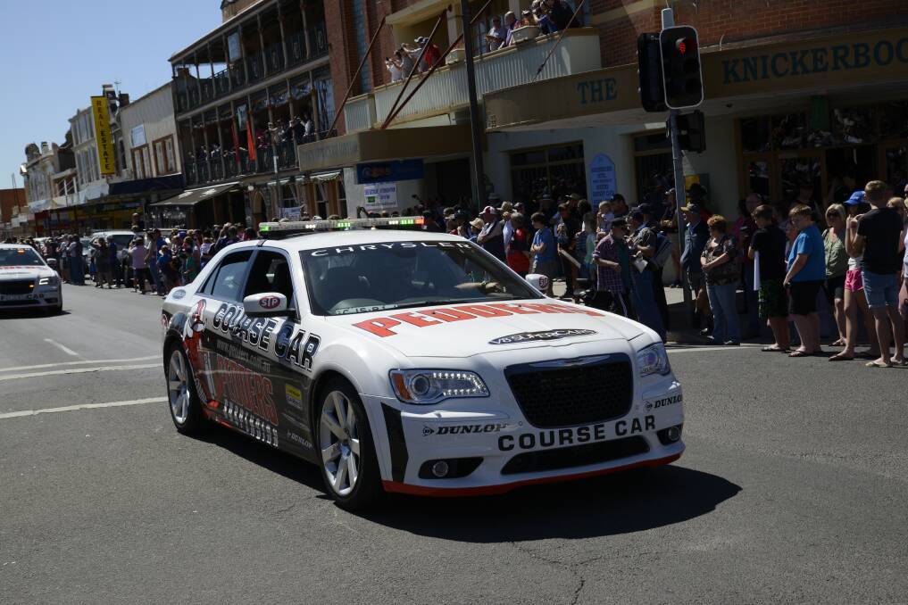 The V8 Supercar Transporter Parade saw the V8 Supercars make a spectacular entrance when they roared into Bathurst with the impressive B-Double parade on Wednesday. Photo: Phill Murray. 