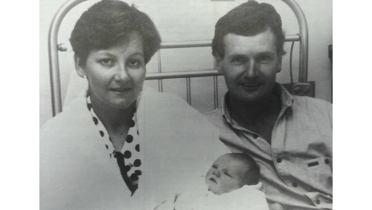 HAPPY 21st: Rob and Beth Cornwell with their new son Jim. 