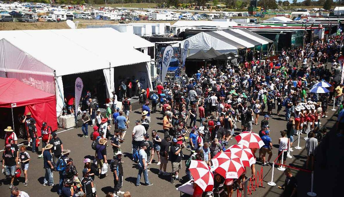 Race fans enjoy the action on the track during day three of the 2013 Bathurst 1000 at Mount Panorama. Photo: Getty Images, Robert Cianflone