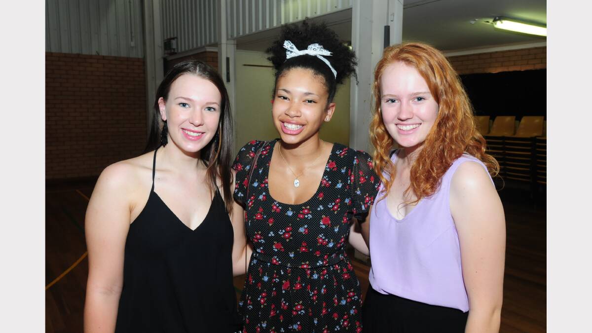Students and teachers at St Johns College celebrated the release of the HSC results and their ATAR on Thursday morning. Pictured are Sara McCarthy, Indie Burke and Grace Whiteley. 