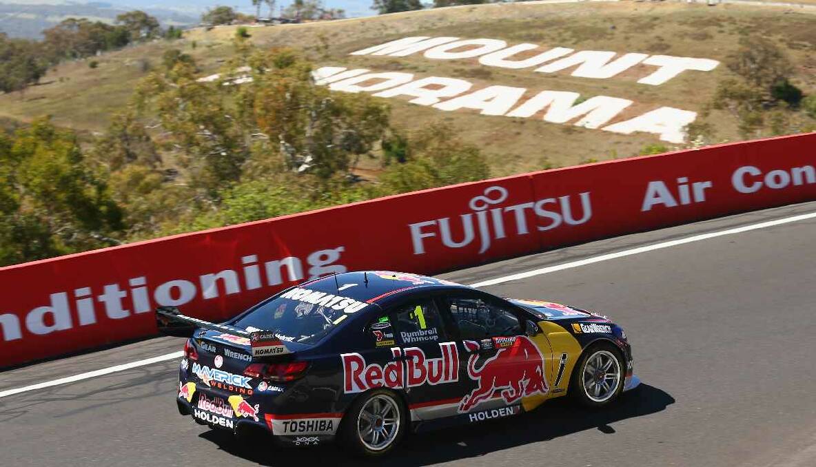 Race fans enjoy the action on the track during day three of the 2013 Bathurst 1000 at Mount Panorama. Photo: Getty Images, Robert Cianflone