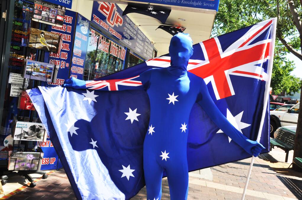 Matthew Toole helps promote $2UP's extensive Australia Day product range. Photo: LISA MINNER