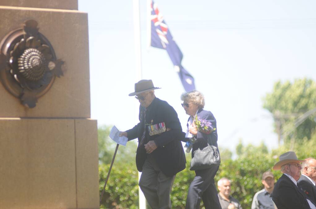 Veterans laying wreaths and flowers at the cenotaph. Photo: JOSH HEARD