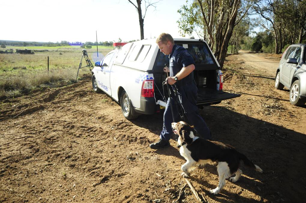 Police conduct a dig at the site of a property outside Dubbo, where police originally believed the victim's body may have been buried. Photo: BELINDA SOOLE