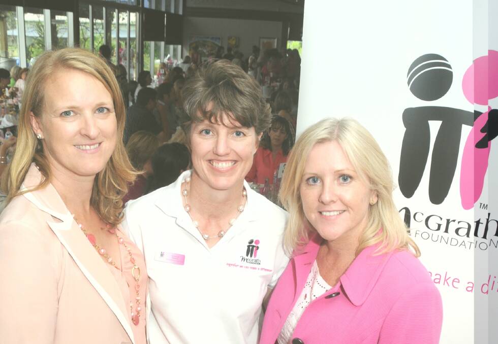 McGrath Foundation chief executive officer Kylea Tink (left), and ambassador and director Tracy Bevan (right) greet McGrath breast care nurse Vanessa Hyland in 2012. Photo: JOSH HEARD