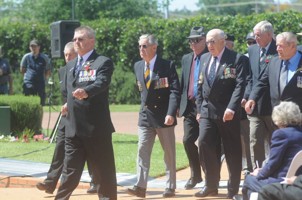 Tom Gray leading Dubbo veterans in the march to the cenotaph. Photo: JOSH HEARD
