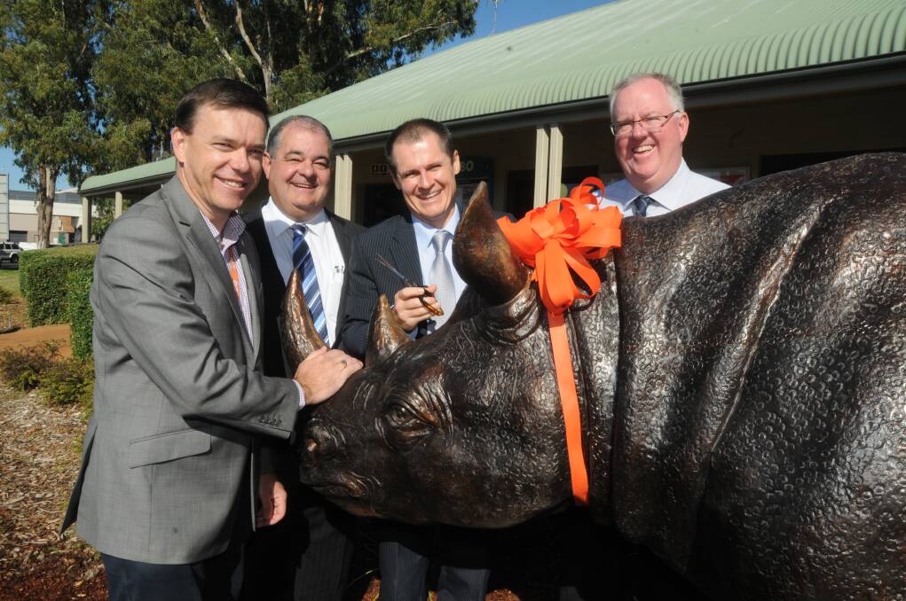 Taronga Western Plains Zoo general manager Matt Fuller, Dubbo City councillor John Walkom, mayor Mathew Dickerson and the council's general manager Mark Riley. Photo: AMY MCINTYRE