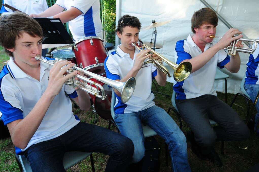 Dubbo District Concert Band members Sam Vail, Daniel Caton and Arney Meguyer.