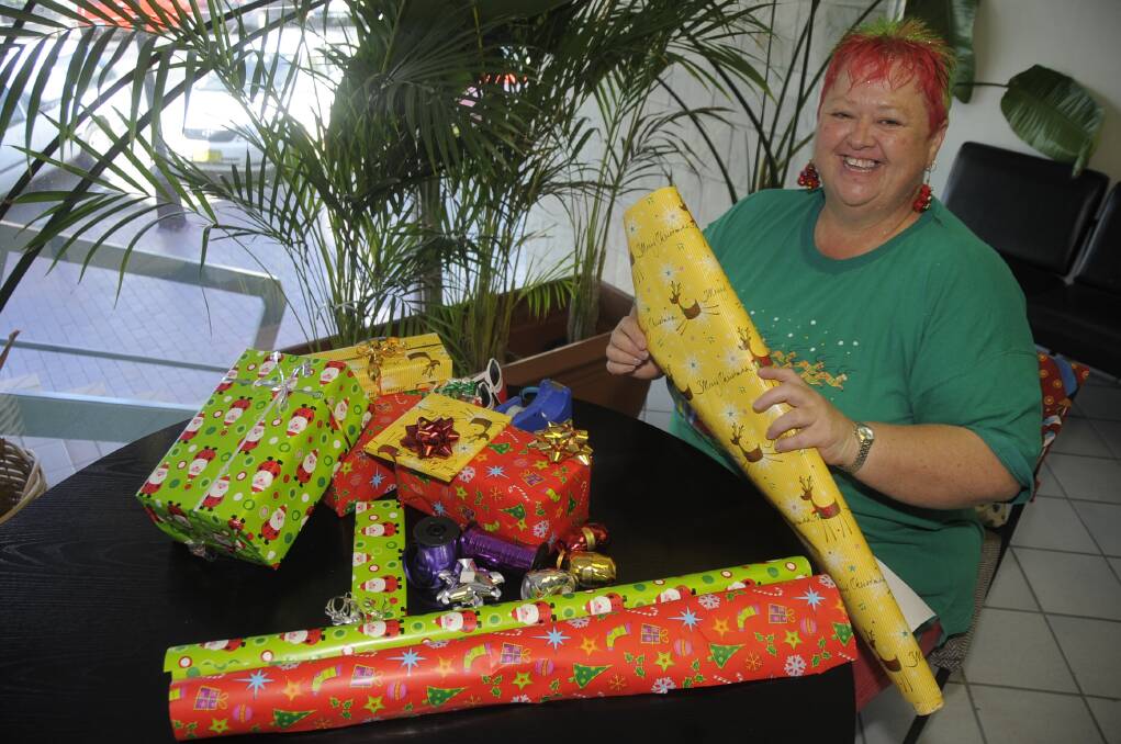 Cathy Neely is encouraging Dubbo residents to become volunteer gift wrappers to help MS Australia. 				   Photo: BELINDA SOOLE