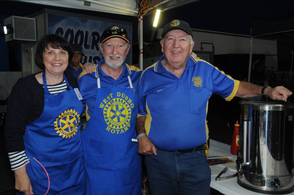 Jo Murphy, Jim McCreadie and Bert McLellan at the Rotary Club of Dubbo West's food stand at the triple j One Night Stand. Their club was one of the seven out of 14 not-for-profit groups to make a surplus from catering efforts at the concert.  			               Photo: CHERYL BURKE