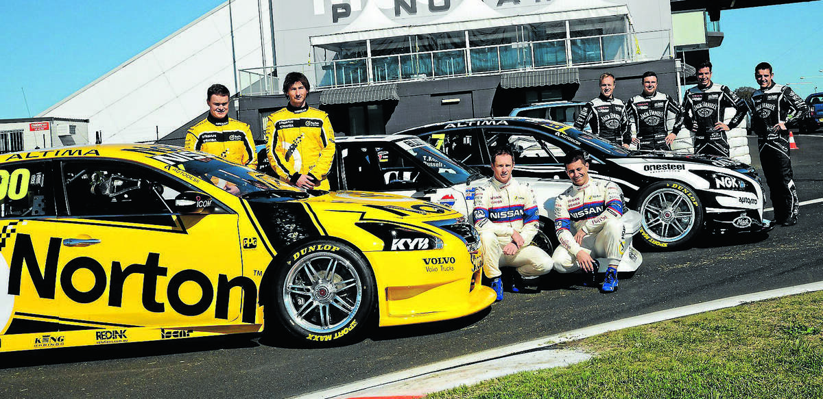Nissan drivers Daniel Gaunt and Michael Caruso (centre) will wear retro-inspired race suits this weekend. Along with their team-mates James Moffat and Taz Douglas (left) and Karl Reindler, David Russell, Rick Kelly and Todd Kelly. Photo: Phill Murray. 