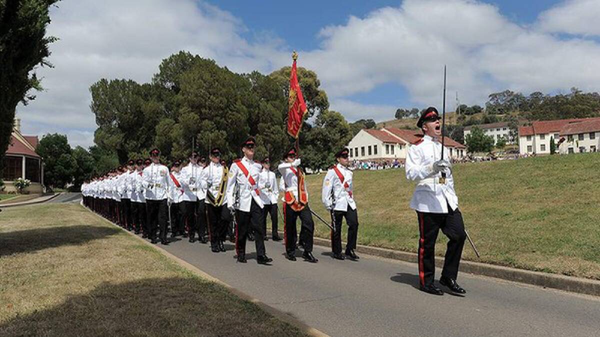 Graduation parade at the Royal Military College, Duntroon for the class of 2012. The changing of the colours ceremony on the parade ground. Photo: Graham Tidy