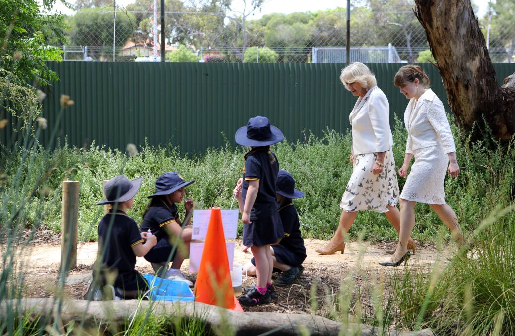 The Duchess of Cornwall speaks with the South Australia Minister for Education and Child Development, Grace Portolesi during a visit to Kilkenny Primary School on November 7, 2012 in Adelaide, Australia. Photo by Chris Radburn - Pool/Getty Images