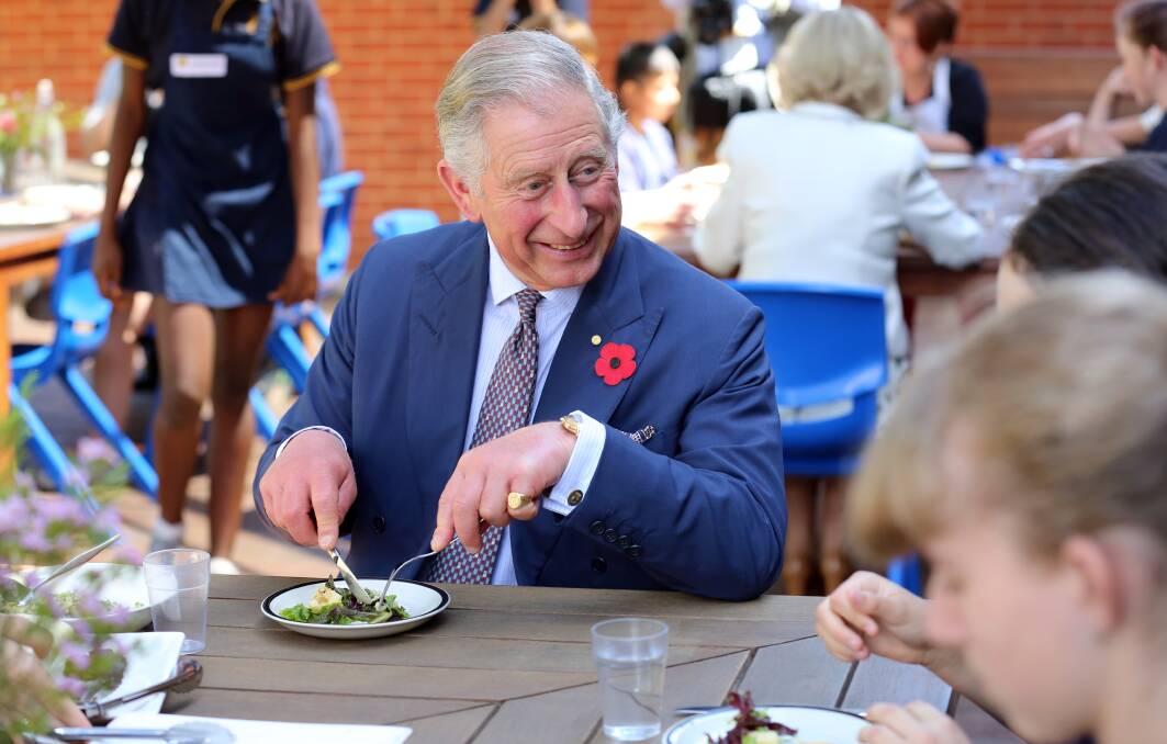 Prince Charles, Prince of Wales has lunch with students after inspecting student gardens during a visit to Kilkenny Primary School on November 7, 2012 in Adelaide, Australia. Photo by Chris Radburn - Pool/Getty Images