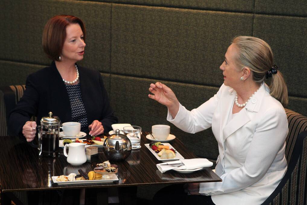 The Prime Minister of Australia Julia Gillard and the US Secretary of State Hillary Clinton enjoy afternoon tea during the annual Australia-United States Ministerial Consultations at the Hyatt Hotel in Perth, Australia. Photo by Colin Murty-Pool/Getty Images