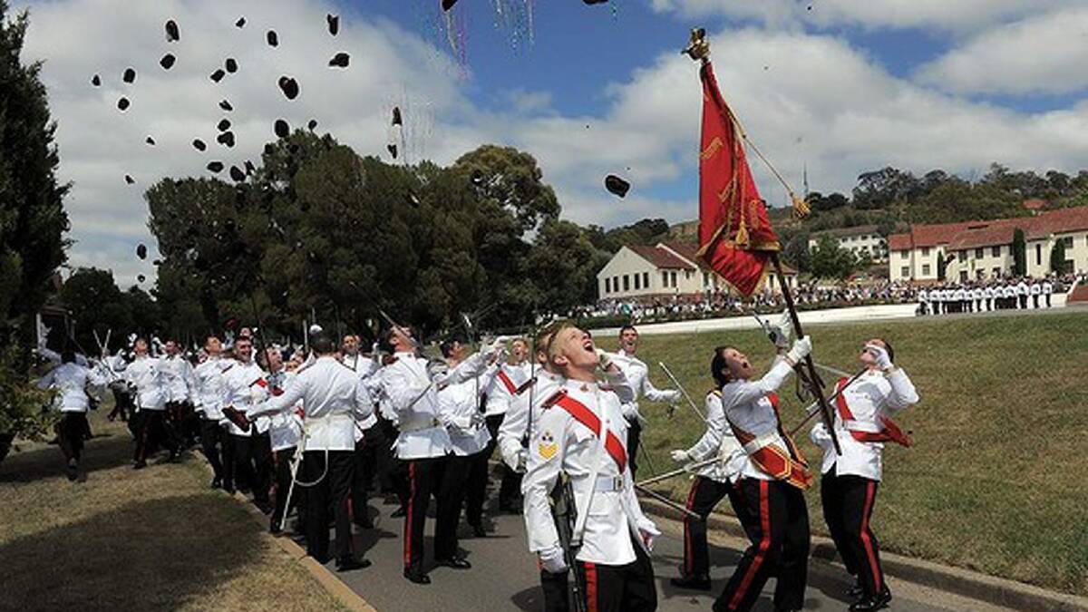 Graduation parade at the Royal Military College, Duntroon for the class of 2012. The changing of the colours ceremony on the parade ground. Photo: Graham Tidy