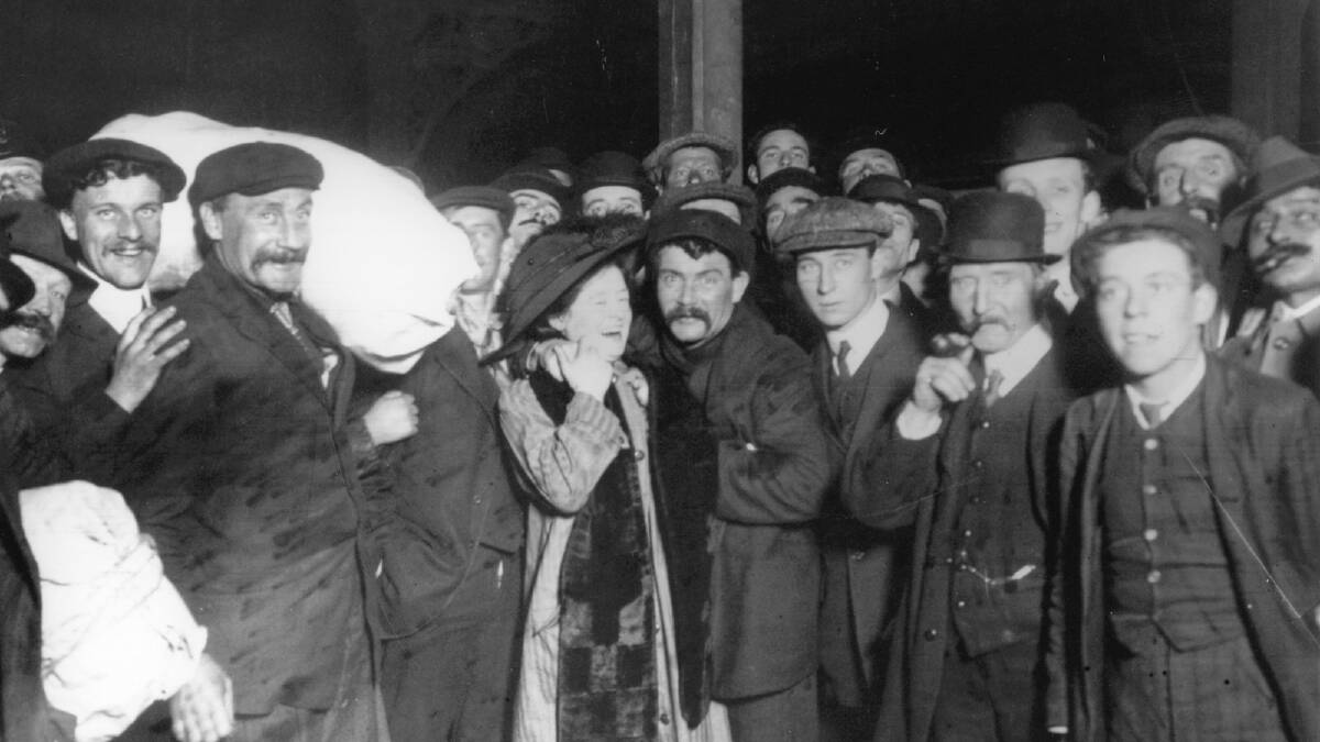 Survivors of the Titanic disaster are greeted by their relatives upon their safe return to Southampton. Photo by Hulton Archive/Getty Images
