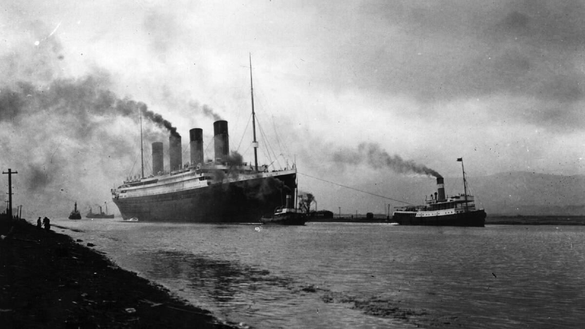 The SS 'Titanic', leaving Belfast to start her trials, pulled by tugs, shortly before her disastrous maiden voyage of April 1912. Photo by Topical Press Agency/Getty Images