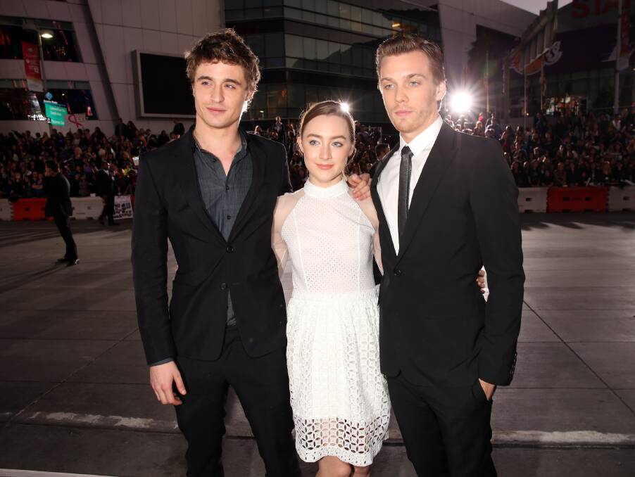 Actors Max Irons, Saoirse Ronan, and Jake Abel arrive at the premiere of Summit Entertainment's 'The Twilight Saga: Breaking Dawn - Part 2' at Nokia Theatre L.A. Live on November 12, 2012 in Los Angeles, California. Photo by Christopher Polk/Getty Images