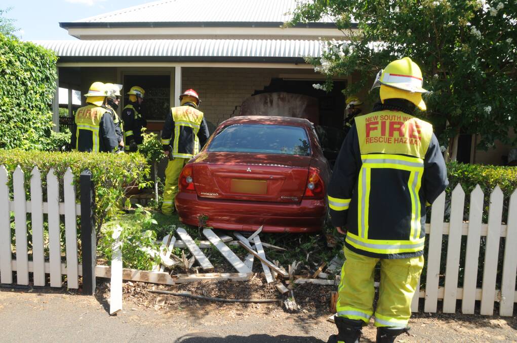 Car crashes into elderly couple's home, passenger taken to hospital with minor injuries. Photo: AMY McINTYRE