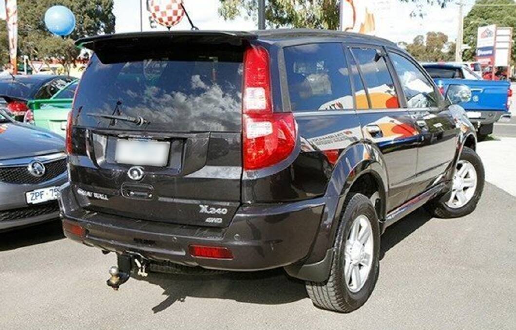 Detective Sergeant Scott Baker appeals for reports of sightings of the seized black Great Wall station wagon in the week from Sunday July 28, after a man and a woman were charged with the murder of Alois Rez, 33, on Saturday.